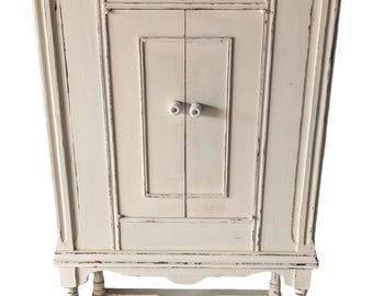 Repurposed Beautiful Antique Radio Cabinet with porcelain knobs.