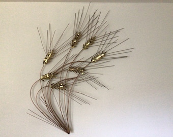 Curtis Jere wall hanging wheat sculpture.