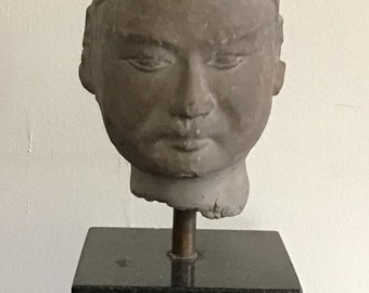Vintage Asian sculptured clay head.