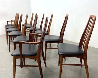 Set of 12 sculpted rosewood Danish dining chairs Model Eva by Niels Koefoed.