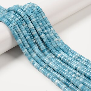 thumbnail image 2 of Light Blue Sea Sediment Jasper Heishi Disc Beads - 2x4mm 3x6mm 15.5 Inch Strand 2 of 6