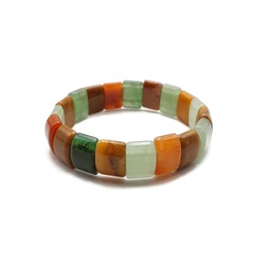 May include: A colorful bracelet composed of square-shaped beads in shades of green, orange, brown, and white. The beads are strung together to form a complete circle, suitable for wrist wear. The bracelet is set against a plain white background.