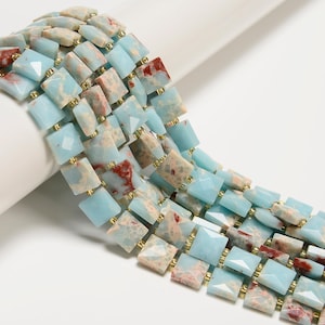 May include: A set of three ceramic mugs with a speckled, matte finish. The mugs are in shades of cream, light gray, and dark gray. Each mug has a simple, minimalist design, perfect for coffee or tea.