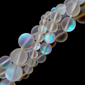 thumbnail image 2 of Black Blue Mystic Mermaid Glass Smooth Round Beads – 6mm 8mm 10mm 12mm – 15.5 Strand Lot 2 of 4
