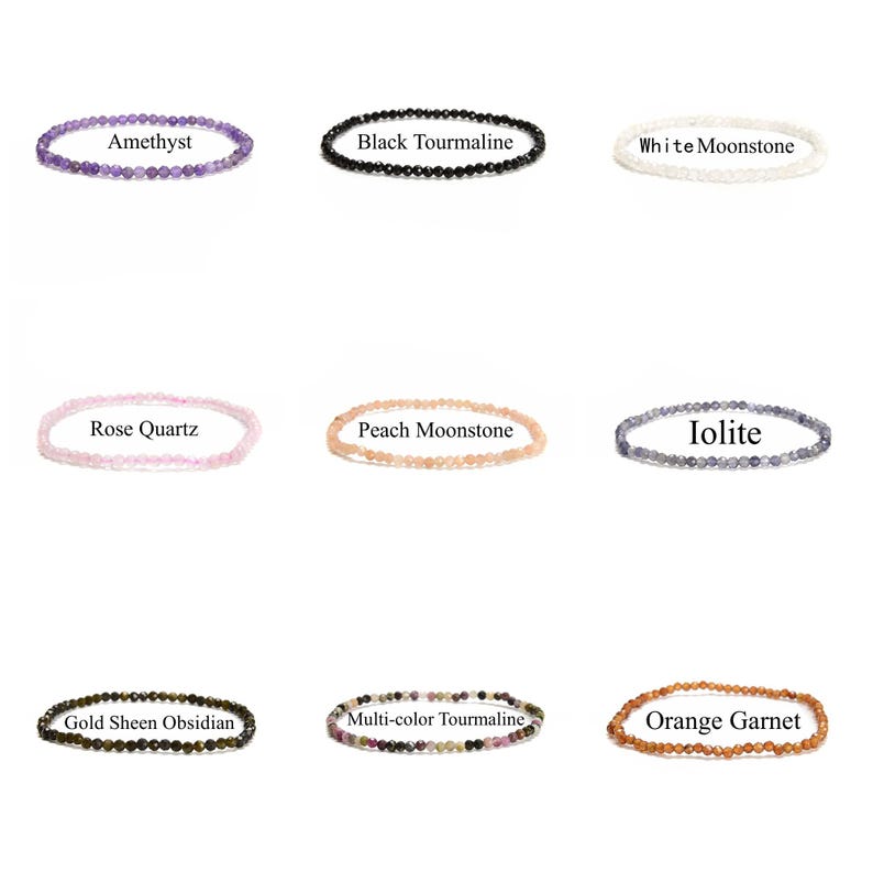 May include: Nine different gemstone bracelets, each with a different color and type of stone. The bracelets are arranged in three rows of three, with the names of the stones printed below each bracelet. The stones include amethyst, black tourmaline, white moonstone, rose quartz, peach moonstone, iolite, gold sheen obsidian, multi-color tourmaline, and orange garnet.