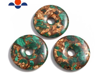 May include: Three round, donut-shaped gemstones with a central hole. The stones feature a mix of green, brown, and gold colors. The gemstones are likely used for jewelry making or other craft projects.