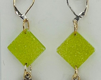 Kiwi Green Glitter Resin Earrings with Silver Evil Eye Charms with Blue Stones
