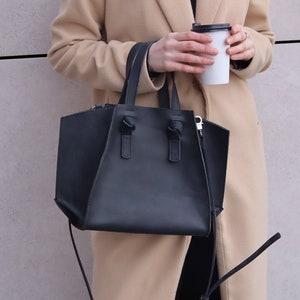 Black medium Purse made of matte leather. Available to order with many add-ons best for you, also comes with a Crossbody strap or Not
