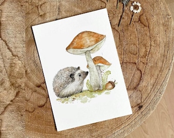 May include: A watercolor painting of a hedgehog standing under a large mushroom with a smaller mushroom behind it. The mushrooms are brown and white with a light brown background.