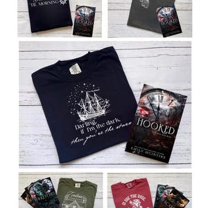 May include: A collection of t-shirts and books featuring nautical and fantasy themes. The t-shirts are black, grey, green, and red. The books are titled "Hooked", "Wretched", "Evelina's", and "His Scarred".