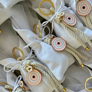 Christening bomboniere / favour pouch and rope keyring with Mati and cross