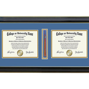 May include: A black framed diploma with a gold trim and a blue mat. The diploma is for a Bachelor of Science in Business Administration. The diploma is from College or University Name. There is a tassel hanging on the right side of the frame.