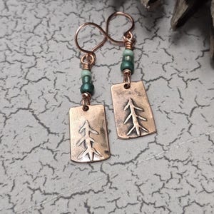 Tree earrings in hand hammered copper with green beads