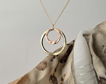 Double circle rustic hand hammered pendant necklace.