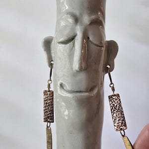 Double dangle mixed metal earrings in textured copper and brass