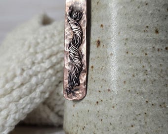 Yarn-themed, hand crafted artisan necklace in reclaimed copper.