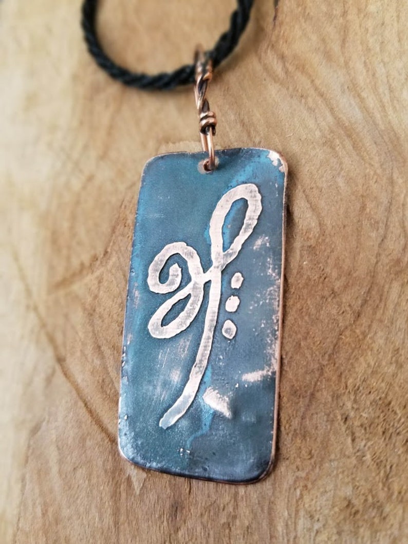 Celtic symbol of strength and perseverance in etched copper | Etsy