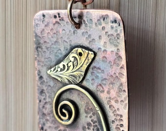 Mixed metal handcrafted bird pendant necklace