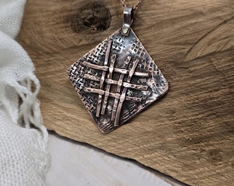 Woven copper pendant necklace in antiqued finish