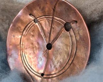 Flame painted copper diz with peace symbol for making sliver or roving for spinning