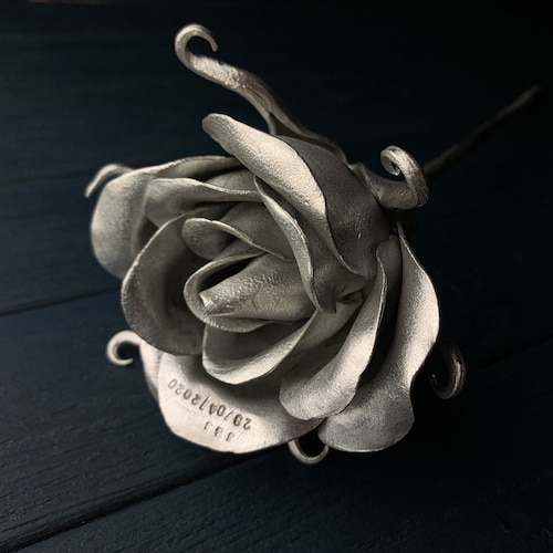 Polished handcrafted aluminum rose for a tenth wedding anniversary