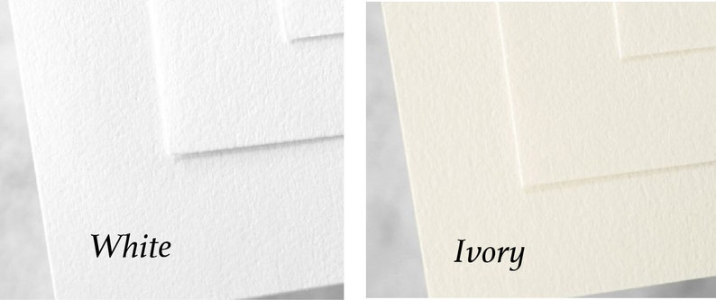 May include: Two paper samples, one white and one ivory, showing the texture of the paper. The paper has a subtle, textured surface.