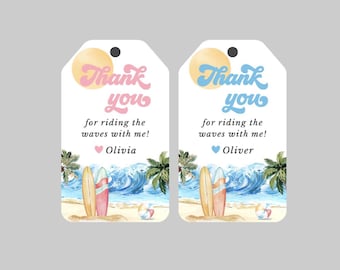 May include: Two thank you tags with a beach scene, surfboards, and palm trees. The text on the tags reads "Thank you for riding the waves with me!" with the names Olivia and Oliver.