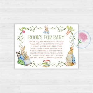 May include: A rectangular baby shower invitation with the text "BOOKS FOR BABY" and a request to bring a book instead of a card. The invitation features illustrations of Peter Rabbit and other garden elements, with a floral border.
