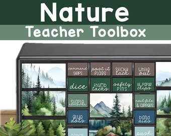 May include: A black teacher toolbox with a nature theme. The toolbox has 12 compartments with labels for various classroom supplies, including dice, thumb tacks, safety pins, paper clips, staple remover, glue dots, pencil lead, post-it flags, command strips, sticky tack, white out, nail file and clippers, and band aids. The compartments are decorated with watercolor paintings of forests and mountains.