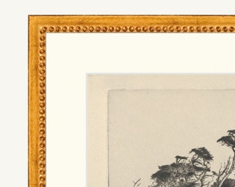 May include: Black and white etching of a landscape with trees in the foreground. The trees are silhouetted against a light background. The etching is framed in a gold frame.