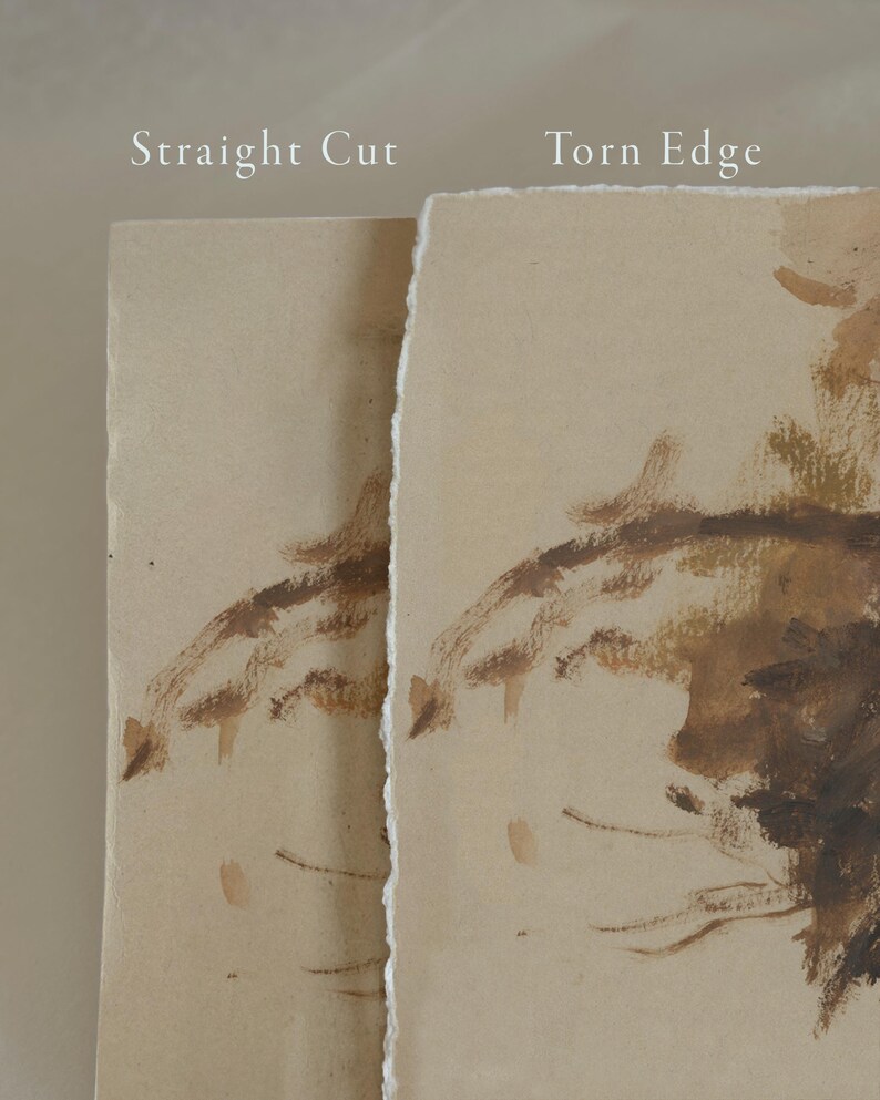 May include: Two pieces of brown paper, one with a straight edge and the other with a torn edge. Both pieces have brown paint strokes on them.