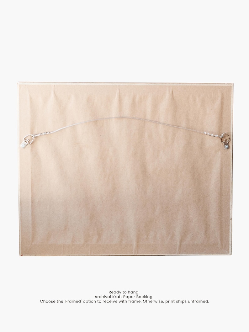 May include: The back of a framed print with a wire hanger and a kraft paper backing. The text on the back reads "Ready to hang. Archival Kraft Paper Backing. Choose the 'Framed' option to receive with frame. Otherwise, print ships unframed."