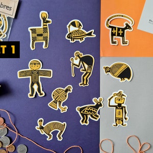 May include: Set of 12 black and gold Mimbres style stickers featuring various animal and human figures. The stickers are arranged on a purple, orange, and gray background. The text "SET 1" is visible in the top left corner.