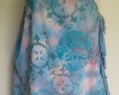 Recycled clothing for Men , women and children made from tee-shirts , hand made original screen prints , tie dyed backgrounds .