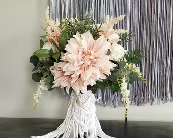 Brides boho bouquet with blush, white roses, blush Dahlias and white ball Dahlias.  Real touch ferns, seeded eucalyptus, and other greenery