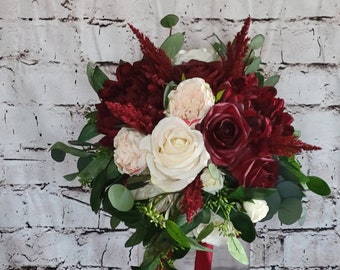 Boho brides wedding bouquet in rich burgundy, blush and cream with seeded and real touch eucalyptus and astilbe.