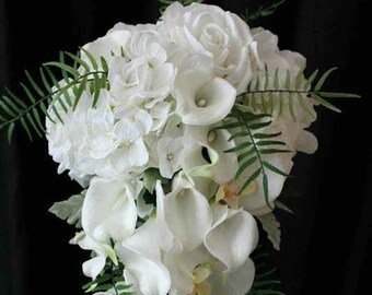 Brides cascading wedding bouquet, white calla lilies, white orchids, hydrangeas and roses, dusty miller and Sage Ferns