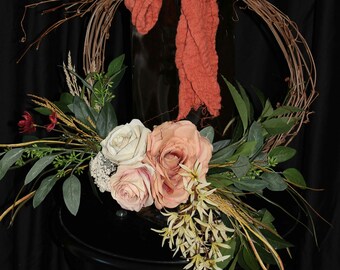 Boho wedding bridesmaids floral hoop in dusty orange, sunset mauve, champagne and rust, roses, orchids. Seeded eucalyptus, queen Anne's lace