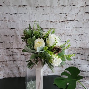 Winter Boho bouquet with White roses, and pine cones, evergreen and eucalyptus and dusty miller. image 1