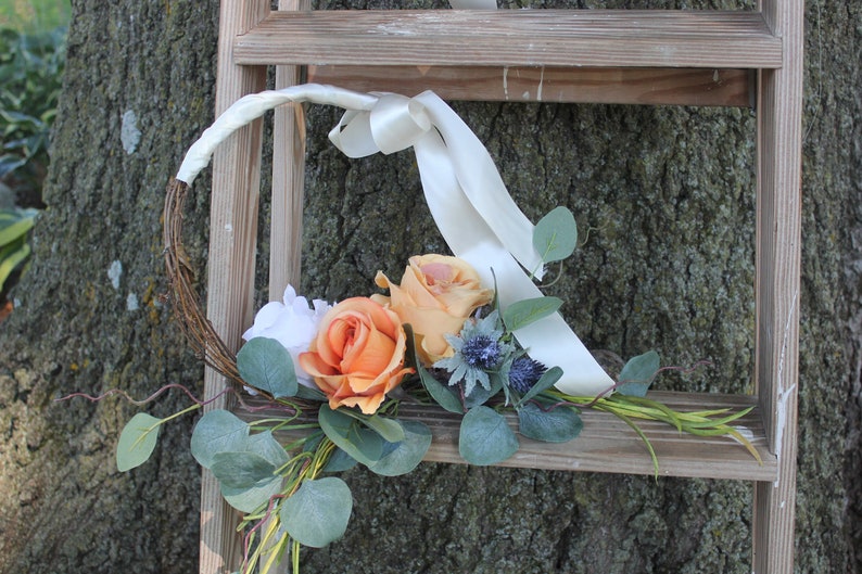 gold and orange roses on a grape vine wreath Cream satin Fall boho floral hoop with cream Eucalyptus navy thistle and grasses to accent