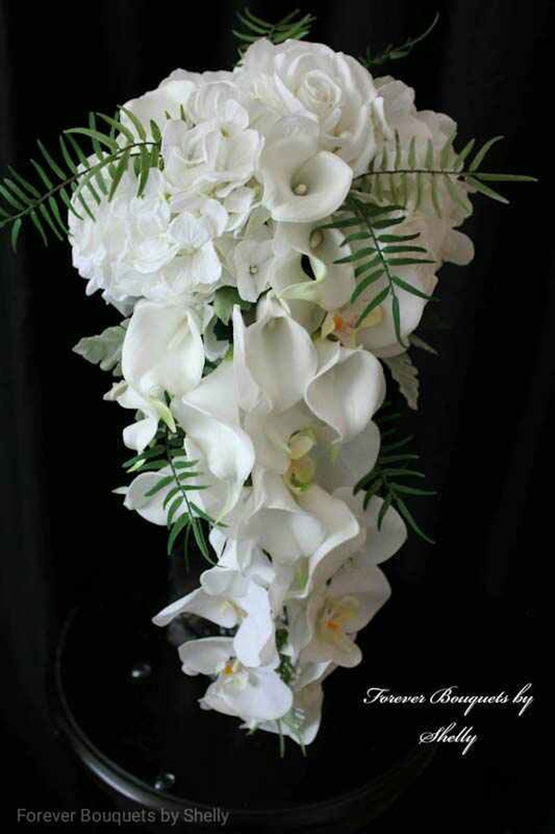 Brides cascading wedding bouquet, white calla lilies, white orchids, hydrangeas and roses, dusty miller and Sage Ferns image 1