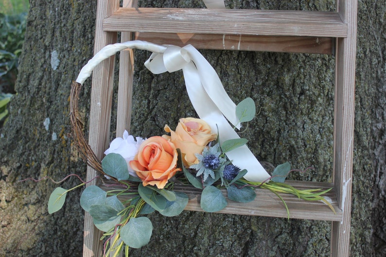 gold and orange roses on a grape vine wreath Cream satin Fall boho floral hoop with cream Eucalyptus navy thistle and grasses to accent