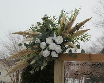 Floral swag for arbor or pergola. Dried Pampas grass, eucalyptus, cabbage roses Palm leaves and greenery
