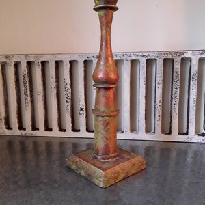 Yellow and copper candleholder