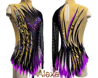 May include: A black and gold leotard with purple accents. The leotard has a high neckline and long sleeves. It is decorated with rhinestones and a geometric pattern.