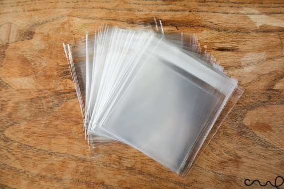 100 piezas de Bolsas de celofán autoadhesivas transparentes, bolsas de  plástico, bolsas para joyeria, bolsas para productos. (Tamaño 9), Moda de  Mujer