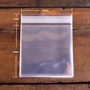 10 x 10 cm 4"x4" 透明小型セロハン OPP プラスチックバッグ 自己接着ディスプレイ梱包 高品質 40ミクロン 剥がしてシール 10 または 50 または 100