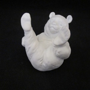 Kaiser white bisque porcelain rolling bear.