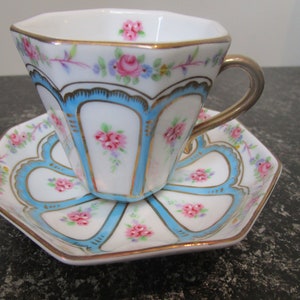 Demi-tasse coffee cup and saucer porcelain