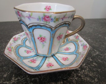 Demi-tasse coffee cup and saucer porcelain